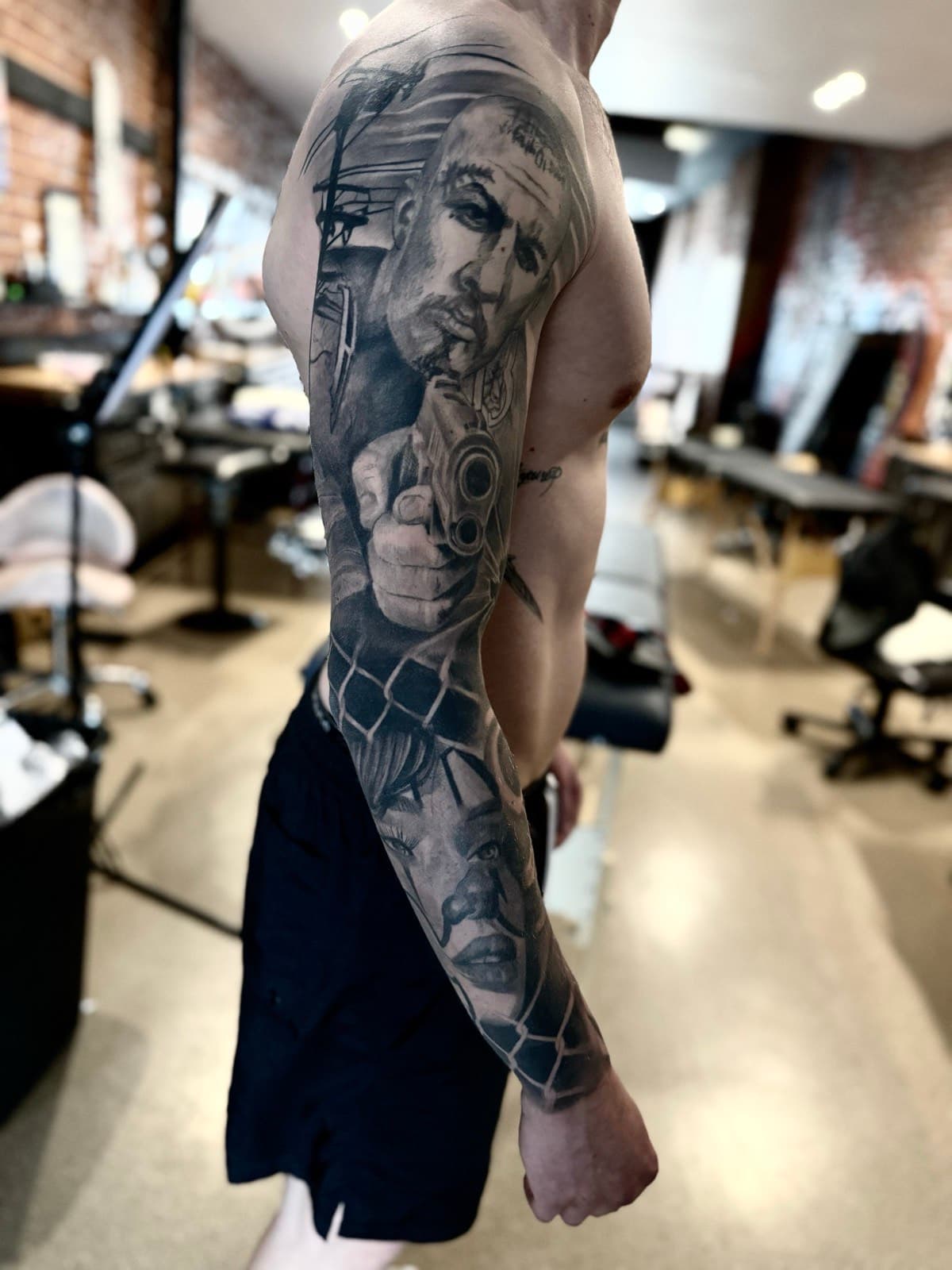 Chicano-style black and grey realism sleeve tattoo by Tobias Meredith in Melbourne