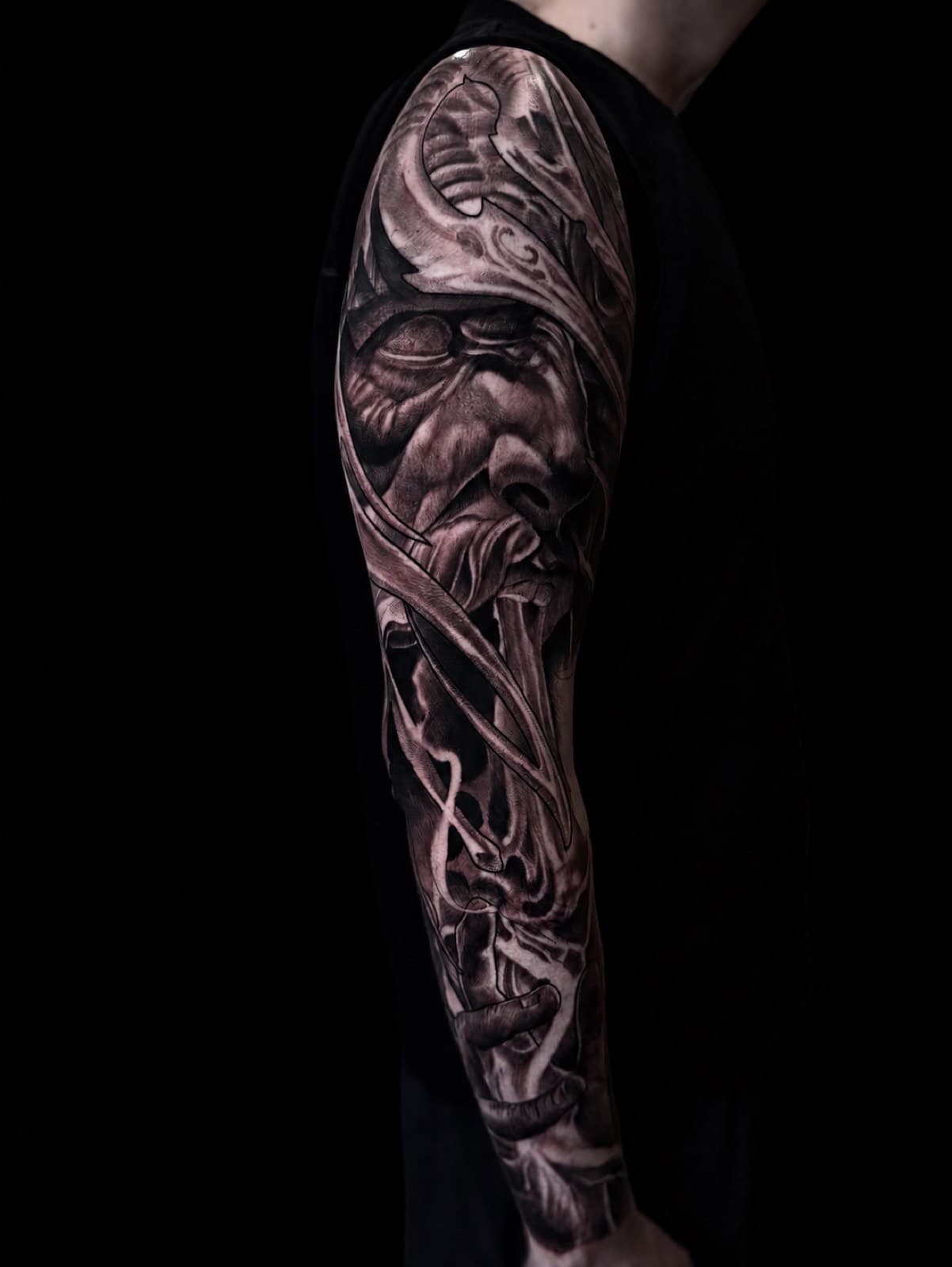 Black and grey mythology realism arm sleeve tattoo by Tobias Meredith in Melbourne